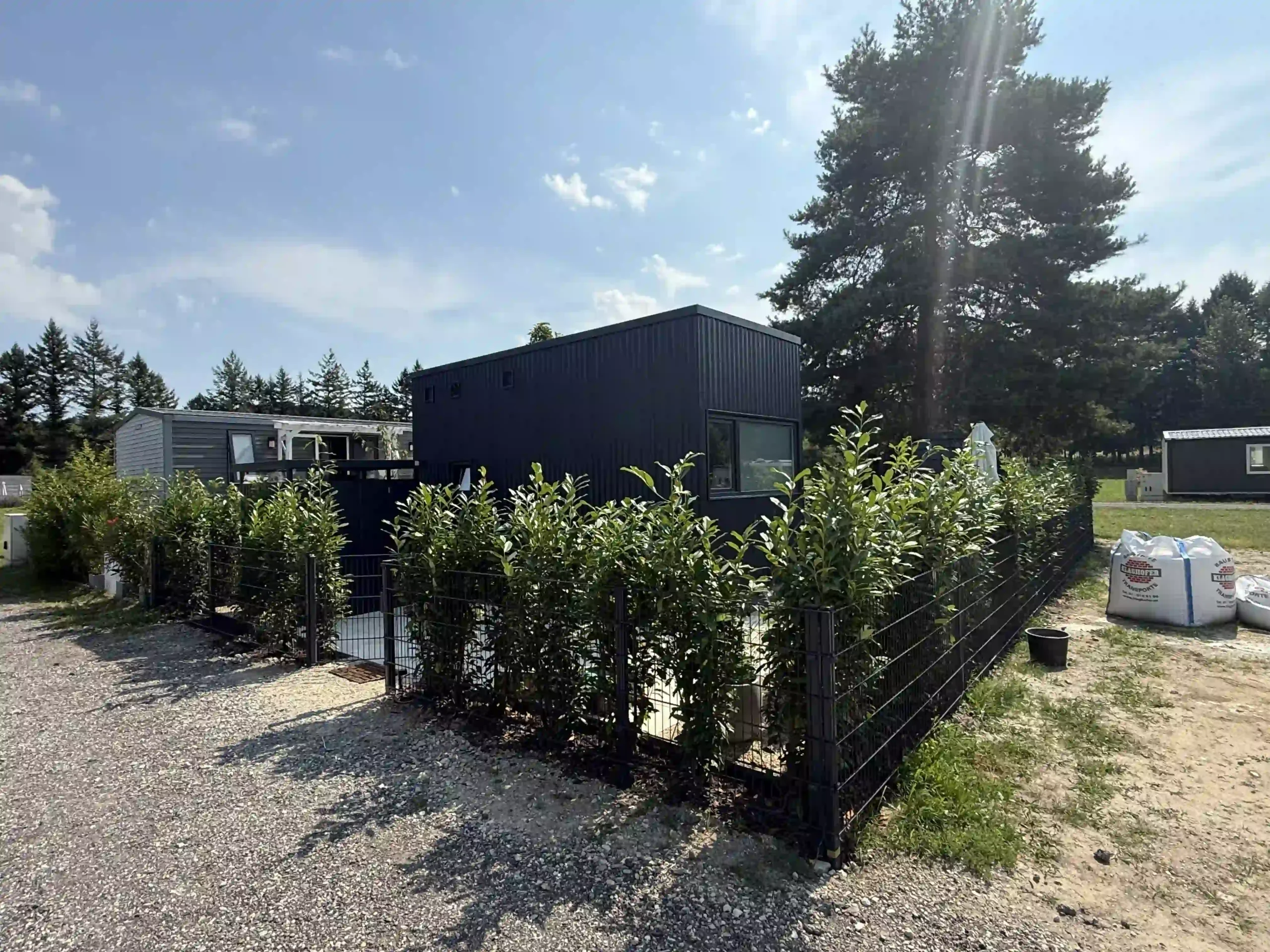 Bagger Wien – EMK Erdbau GmbH – Einfamilienhaus – Gartenanlage