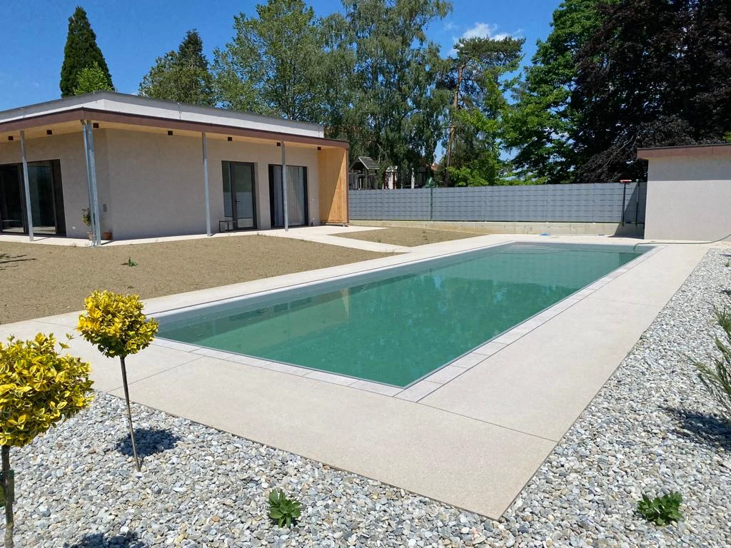 Bagger Wien – EMK Erdbau GmbH – Einfamilienhaus – Poolbau – Garten