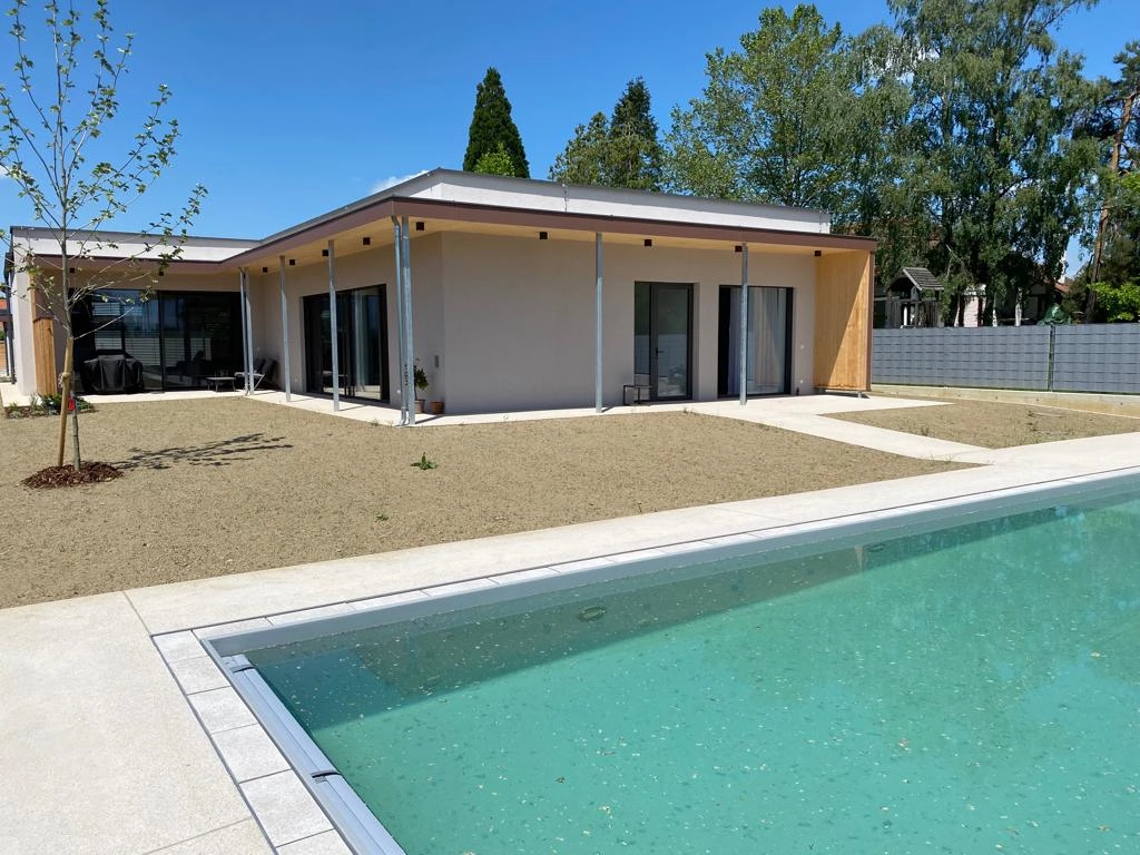 Bagger Wien – EMK Erdbau GmbH – Einfamilienhaus – Poolbau – Gartengestaltung