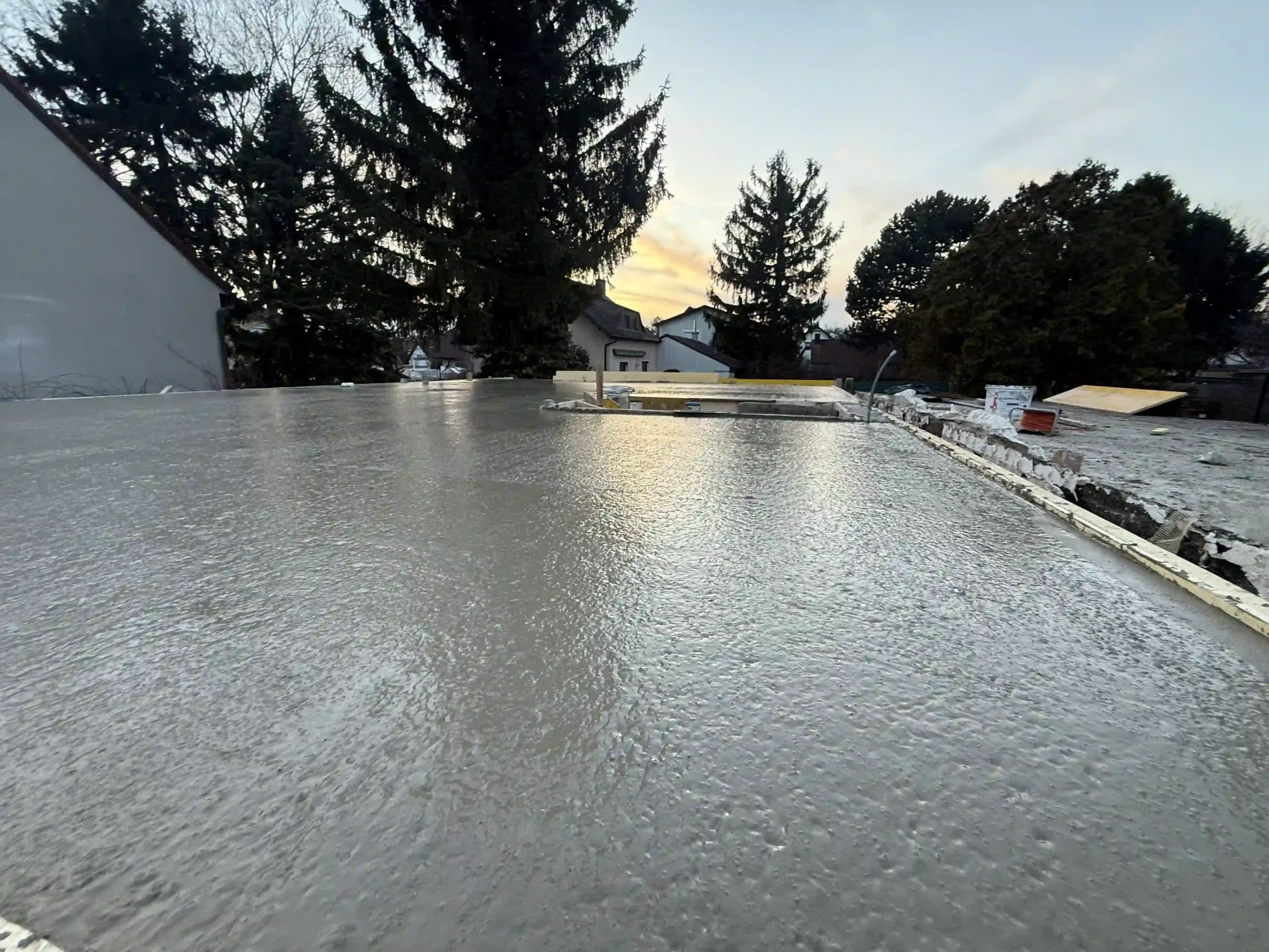 Bagger Wien – EMK Erdbau GmbH – Einfamilienhaus – Rohbau – Beton